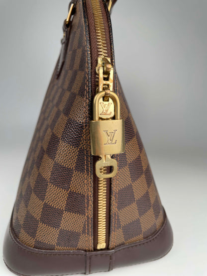 Alma PM - Damier Ebene Canvas