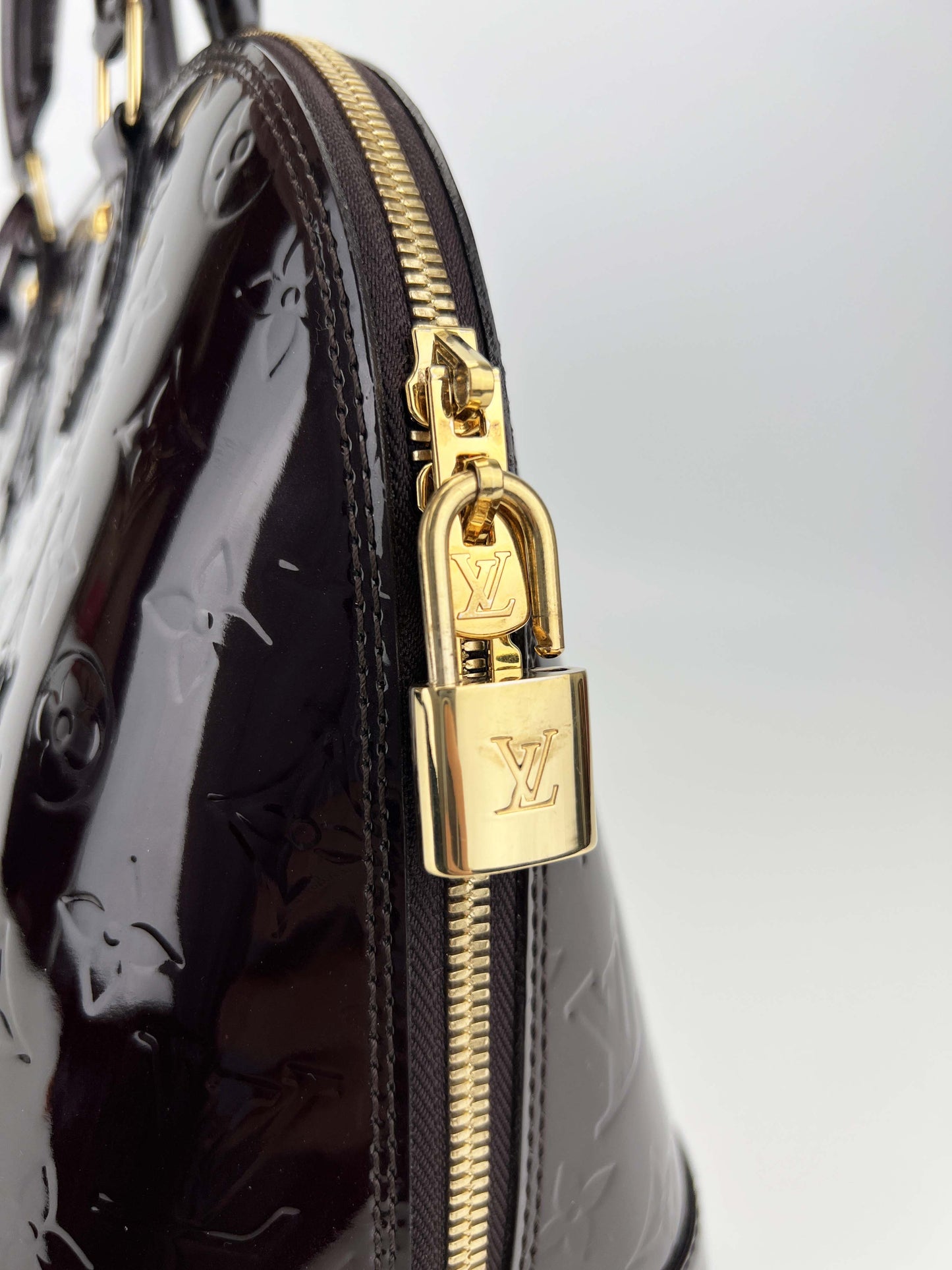 Alma PM Amarante - Monogram Vernis